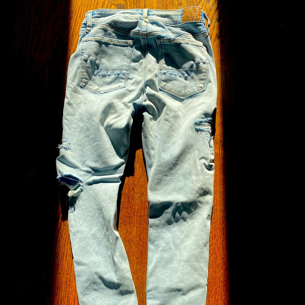 American Eagle faded ripped jeans size 4